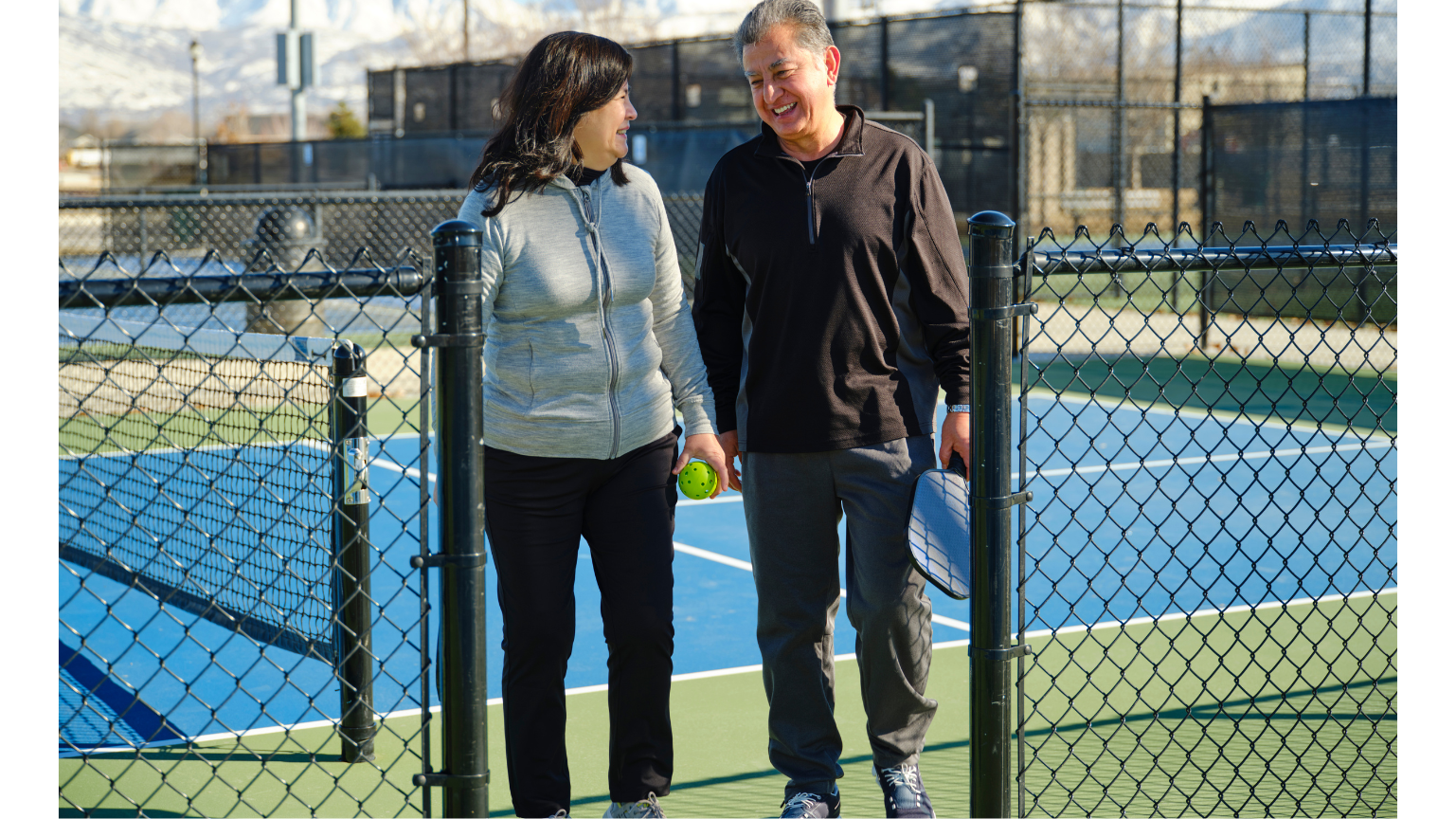 Precision Wellness-Couple playing pickleball